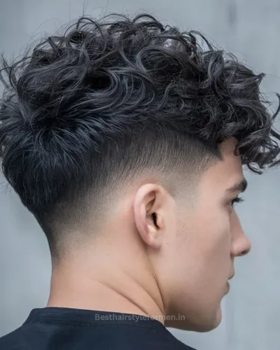 Curly drop fade haircut for men