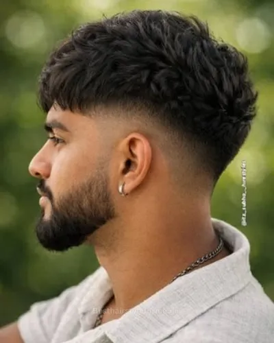 Low drop fade with messy top