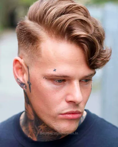 Wavy comb over with hard part