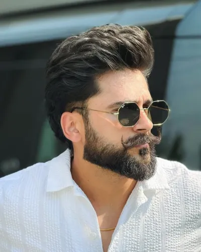 Best hairstyle for men with thin fine hair featuring a messy fringe to add volume