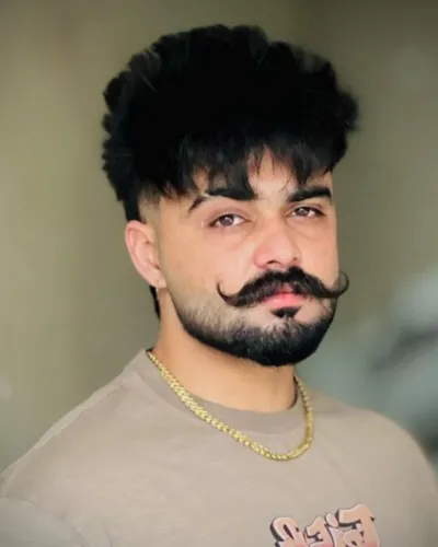 Best hairstyle for men with a heart shaped face showcasing a modern mullet and burst fade