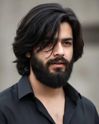 Best hairstyle for men with an oblong face featuring a side swept fringe and layered top