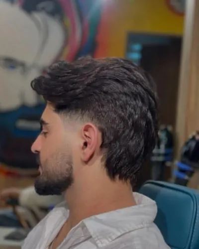 Best hairstyle for men with a receding hairline featuring a messy textured French crop