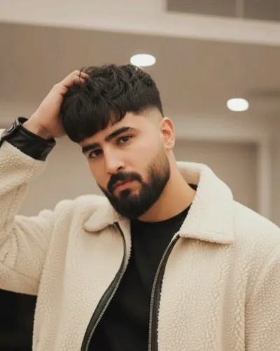 Best hairstyle for men for Indian summers featuring a disconnected undercut and slick back
