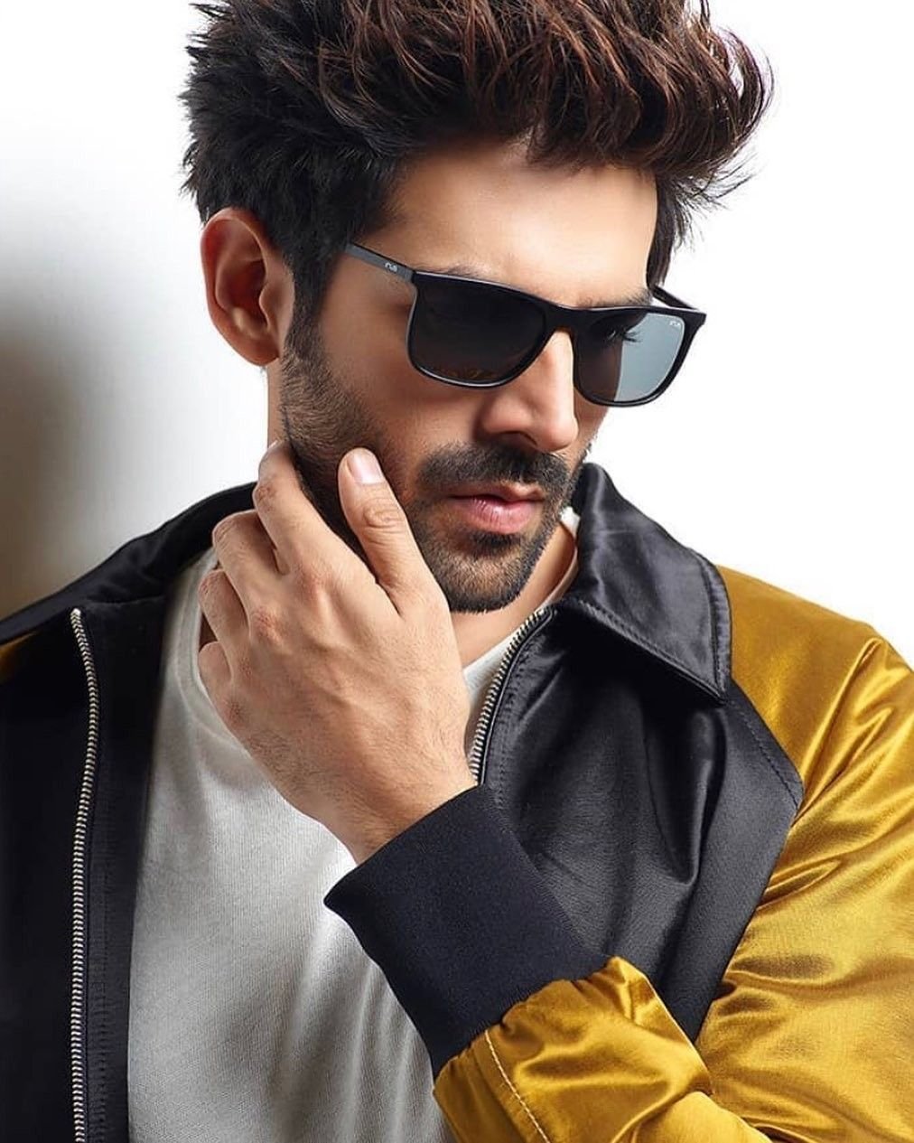 Kartik Aaryan textured fringe hairstyle for men
