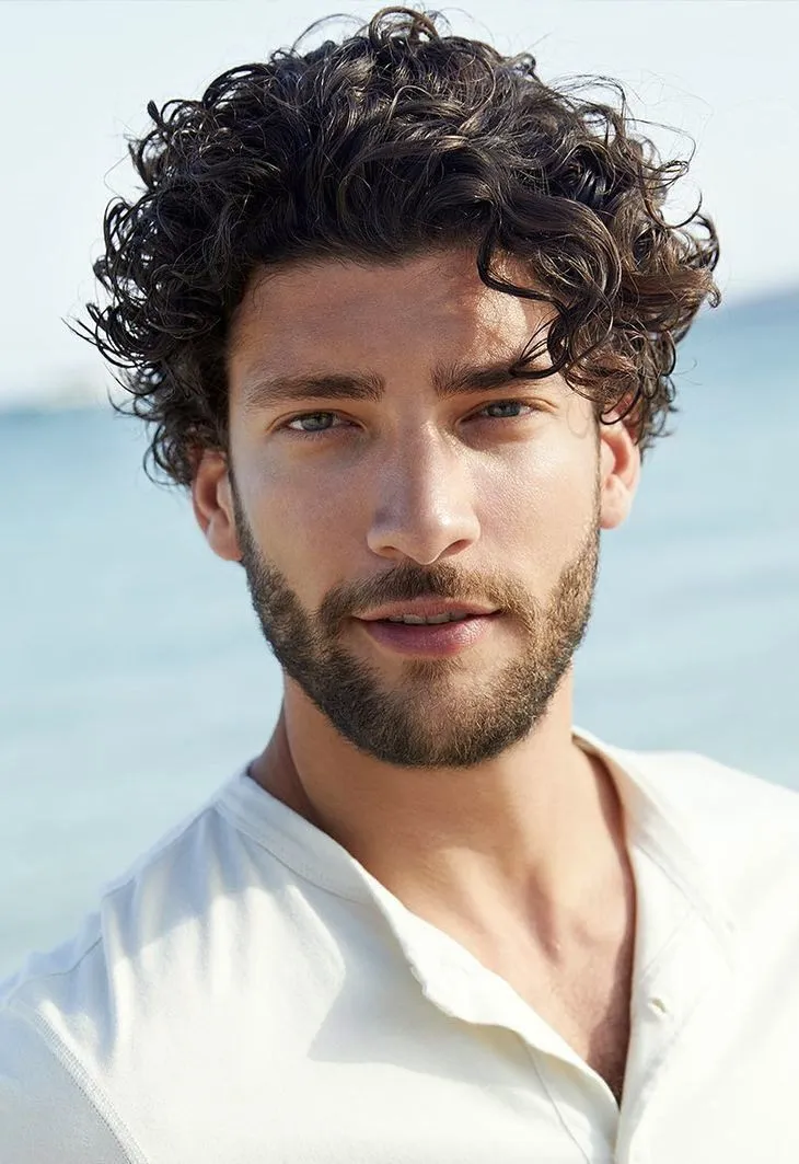 long thick curly hairstyle for men