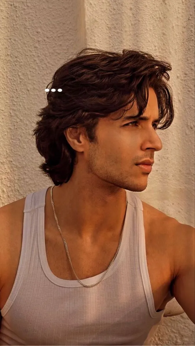 medium straight swept back hair for men style 2