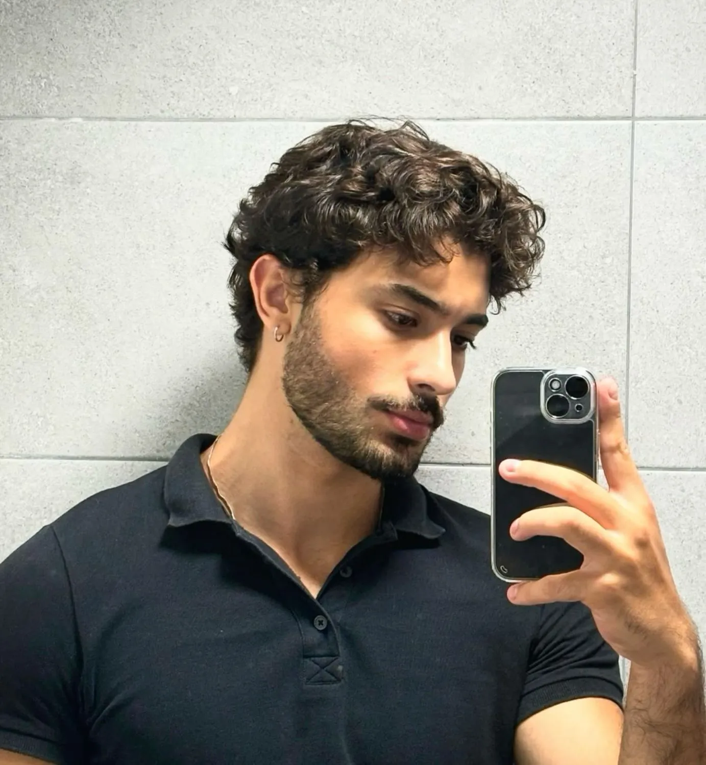 messy curly hair for men light shirt
