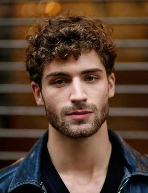 messy curly wavy hairstyle for men