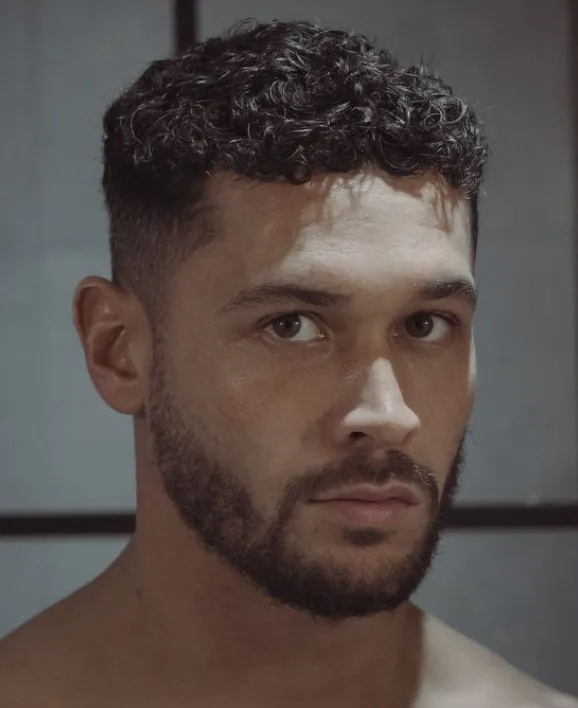 short curly hairstyle for men