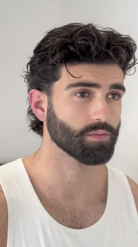 Long Hairstyles 77 thick curly mullet with beard for men