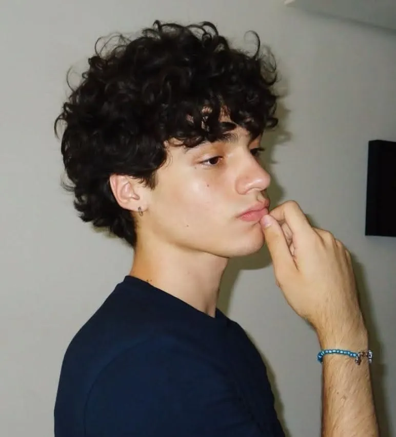 thick long curly hairstyle for men